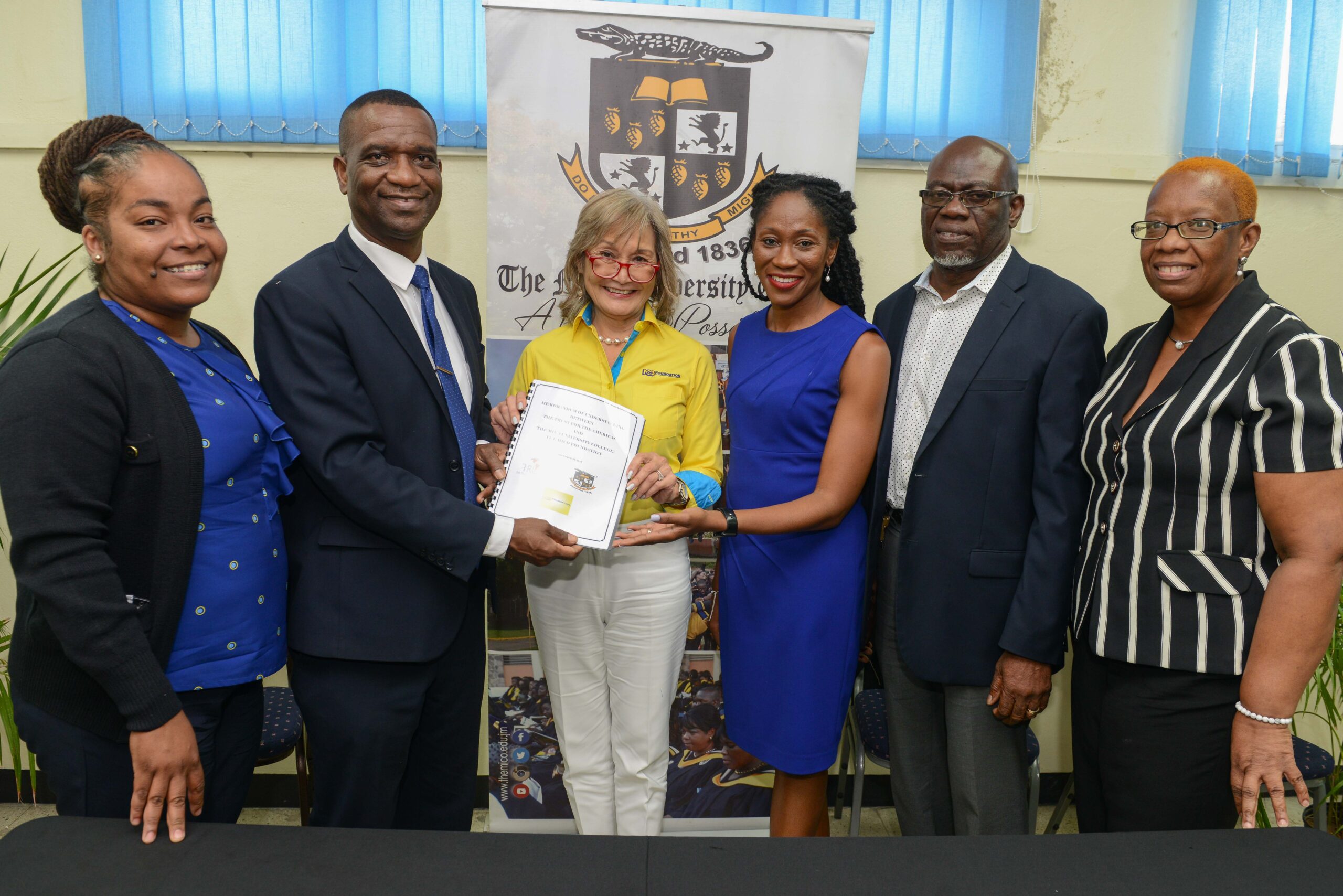 Left to right. Jamilia Crooks, NCB Foundation, Dr. Asburn Pinnock, President of the Mico University College, Mrs. Thalia Lyn, Chairperson of the NCB Foundation Mrs. Nadeen Matthew's Blair, CEO of NCB Foundation, Mr. Burchell Duhaney, Secretary Manager The Mico Foundation, Mrs. Sharon Heslop Brown , Project Coordinator The Mico Foundation.
